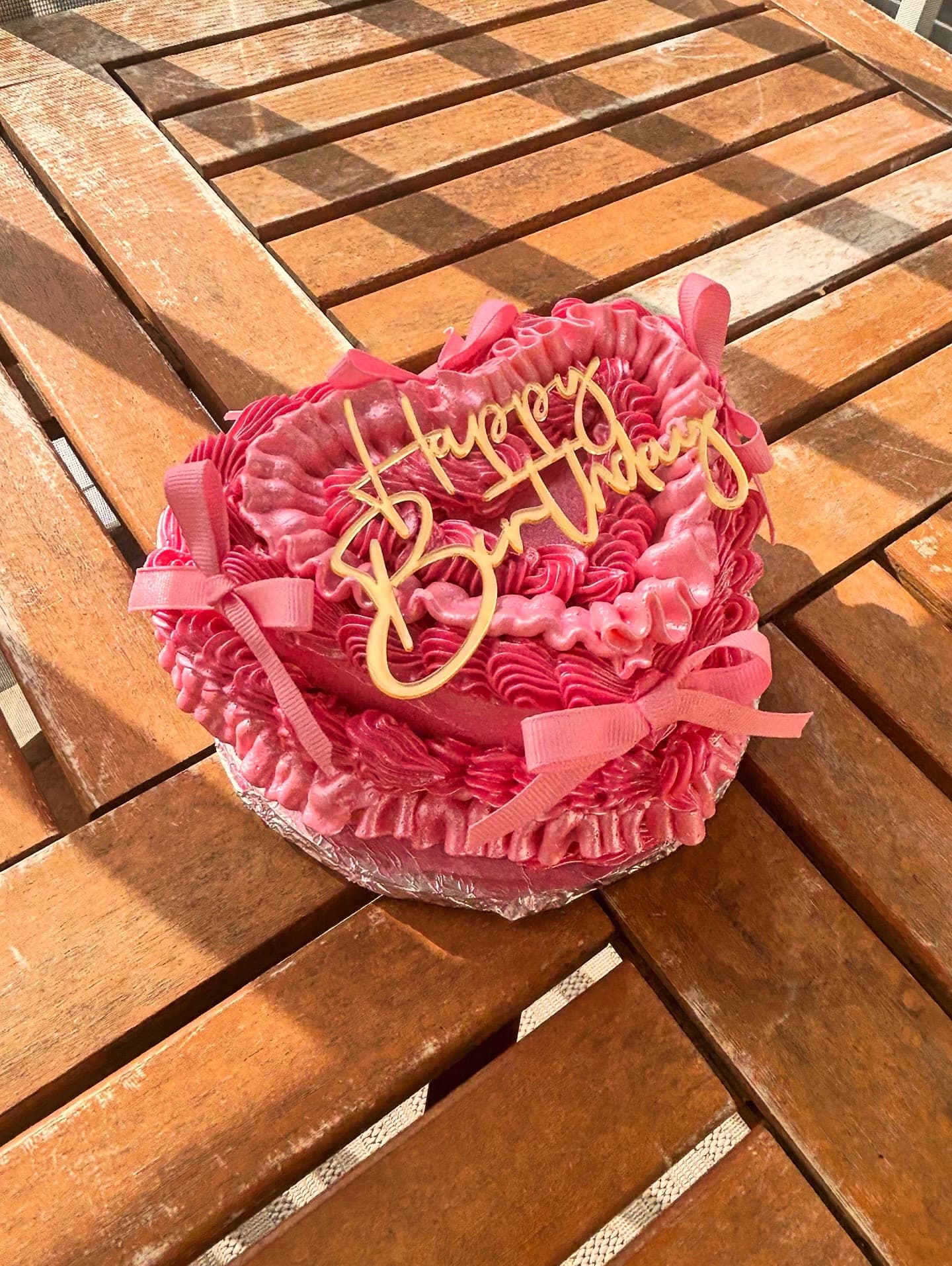 Pink bow custom cake